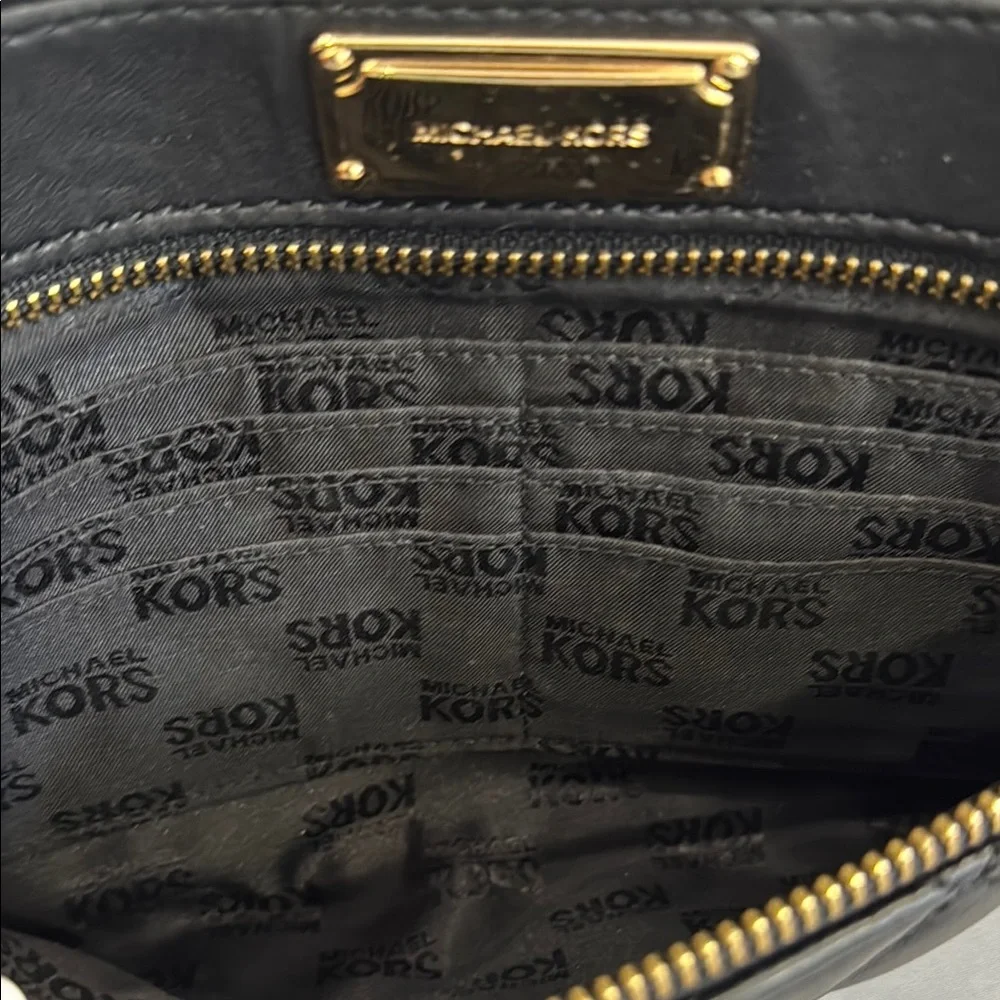 Michael Kors Black and Gold Quilted Leather Clutch